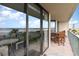 Balcony with ocean view and patio furniture at 4001 S Ocean Blvd. # Apt 2C, North Myrtle Beach, SC 29582