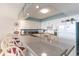 Well-equipped kitchen with white cabinets and granite countertops at 4001 S Ocean Blvd. # Apt 2C, North Myrtle Beach, SC 29582