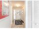 Clean entryway with tile floor and coat closet at 4001 S Ocean Blvd. # Apt 2C, North Myrtle Beach, SC 29582