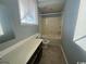Bathroom with a shower-tub combo, vanity, and tiled flooring at 3831 Masters Ct. # 137, Myrtle Beach, SC 29577