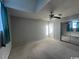 Large bedroom featuring a ceiling fan, mirrored closet doors, and carpeted floors at 3831 Masters Ct. # 137, Myrtle Beach, SC 29577