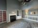 Spacious living room with fireplace, built-in shelves, and access to a dining area at 3831 Masters Ct. # 137, Myrtle Beach, SC 29577