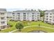 Apartment community exterior surrounded by green spaces at 4829 Luster Leaf Circle # 403, Myrtle Beach, SC 29577