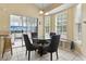 Breakfast nook with glass-top table and chairs, overlooking the garden at 490 Blackberry Ln., Myrtle Beach, SC 29579