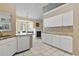 Well-equipped kitchen with granite counters and breakfast nook at 490 Blackberry Ln., Myrtle Beach, SC 29579