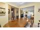 Open dining area with a spacious wooden table and access to the living room at 490 Blackberry Ln., Myrtle Beach, SC 29579
