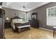 Spacious bedroom with hardwood floors and a ceiling fan at 490 Blackberry Ln., Myrtle Beach, SC 29579