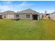 View of the backyard with green grass at 338 Spruce Pine Way, Conway, SC 29526