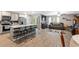 Open floor plan showcasing kitchen, island, and living room at 338 Spruce Pine Way, Conway, SC 29526
