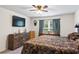 Spacious bedroom with large window, dresser, and king-size bed at 338 Spruce Pine Way, Conway, SC 29526