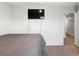 Simple bedroom with a queen bed and access to another room at 338 Spruce Pine Way, Conway, SC 29526