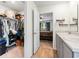 Bathroom with double vanity and access to bedroom and closet at 338 Spruce Pine Way, Conway, SC 29526
