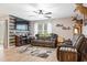 Spacious living room with leather furniture and a rustic feel at 338 Spruce Pine Way, Conway, SC 29526