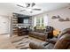 Spacious living room with large TV and fireplace at 338 Spruce Pine Way, Conway, SC 29526