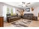 Relaxing living room featuring brown leather sofas at 338 Spruce Pine Way, Conway, SC 29526