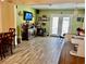 Living room with fireplace, hardwood floors, and ample natural light at 1025 Carolina Rd. # F2, Conway, SC 29526