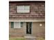 Brick building exterior with dark brown roof and a glass front door at 1025 Carolina Rd. # F2, Conway, SC 29526