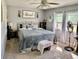 Bedroom with king-size bed, ceiling fan, and ample closet space at 1025 Carolina Rd. # F2, Conway, SC 29526