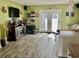 Spacious living room featuring a fireplace and access to the backyard at 1025 Carolina Rd. # F2, Conway, SC 29526