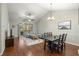 Open living and dining area with hardwood floors and vaulted ceilings at 5750 Oyster Catcher Dr. # 1134, North Myrtle Beach, SC 29582