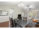 Open dining area with a view to the living room and patio at 5750 Oyster Catcher Dr. # 1134, North Myrtle Beach, SC 29582