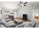Spacious living room with sectional sofa, coffee table, and wood floors at 5750 Oyster Catcher Dr. # 1134, North Myrtle Beach, SC 29582