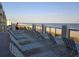 Rooftop deck with lounge chairs and ocean view at 5801 Oyster Catcher Dr. # 413, North Myrtle Beach, SC 29582
