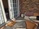 Screened porch with wicker furniture and view of the community at 5801 Oyster Catcher Dr. # 413, North Myrtle Beach, SC 29582