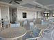 Community room with tables and chairs at 5801 Oyster Catcher Dr. # 413, North Myrtle Beach, SC 29582