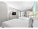 Bedroom with two twin-size beds and bathroom access at 2701 S Ocean Blvd. # 1817, North Myrtle Beach, SC 29582