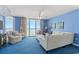 Ocean view living room with comfortable seating and calming blue decor at 1625 S Ocean Blvd. # 1305, North Myrtle Beach, SC 29582