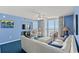 Bright living room with ocean view and comfy seating at 1625 S Ocean Blvd. # 1305, North Myrtle Beach, SC 29582