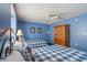 Bedroom with two double beds, ceiling fan, and blue walls at 1625 S Ocean Blvd. # 1305, North Myrtle Beach, SC 29582