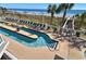 Relaxing lazy river pool with lounge chairs and ocean views at 1625 S Ocean Blvd. # 1305, North Myrtle Beach, SC 29582