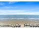 Aerial view of beach with ocean and people at 1625 S Ocean Blvd. # 1305, North Myrtle Beach, SC 29582