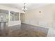 Spacious dining room with tile floors and a chandelier at 84 S Addison Cottage Way # 213, Murrells Inlet, SC 29576