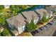 Aerial view of apartment building and surrounding parking at 84 S Addison Cottage Way # 213, Murrells Inlet, SC 29576