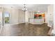 Open dining area with tile floors and access to kitchen at 84 S Addison Cottage Way # 213, Murrells Inlet, SC 29576