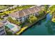 Aerial view showcasing the community pool and waterfront location at 84 S Addison Cottage Way # 213, Murrells Inlet, SC 29576