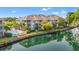 Aerial view of a waterfront community with townhouses and a pool at 84 S Addison Cottage Way # 213, Murrells Inlet, SC 29576