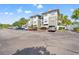 Exterior view of the Culbertson building and parking area at 84 S Addison Cottage Way # 213, Murrells Inlet, SC 29576
