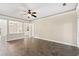 Living room with tile floors, ceiling fan and access to other rooms at 84 S Addison Cottage Way # 213, Murrells Inlet, SC 29576