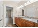 Double vanity bathroom with granite countertop at 84 S Addison Cottage Way # 213, Murrells Inlet, SC 29576