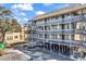 Three-story building exterior with balconies and parking underneath at 9621 Shore Dr. # G219, Myrtle Beach, SC 29572