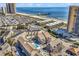 Aerial view of oceanfront community with resort amenities and pier at 9621 Shore Dr. # G219, Myrtle Beach, SC 29572