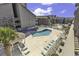 Inviting pool area with multiple lounge chairs and a gazebo at 9621 Shore Dr. # G219, Myrtle Beach, SC 29572