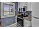 Kitchen with stainless steel appliances and white cabinets at 9621 Shore Dr. # G219, Myrtle Beach, SC 29572