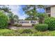 Cypress Bay community entrance with landscaping at 4278 Pinehurst Circle # W2, Little River, SC 29566