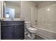 Bathroom with tub, toilet, vanity, and mirror at 318 Barn Owl Way, Conway, SC 29527
