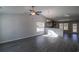 Open living room with high ceilings and wood-look floors at 318 Barn Owl Way, Conway, SC 29527